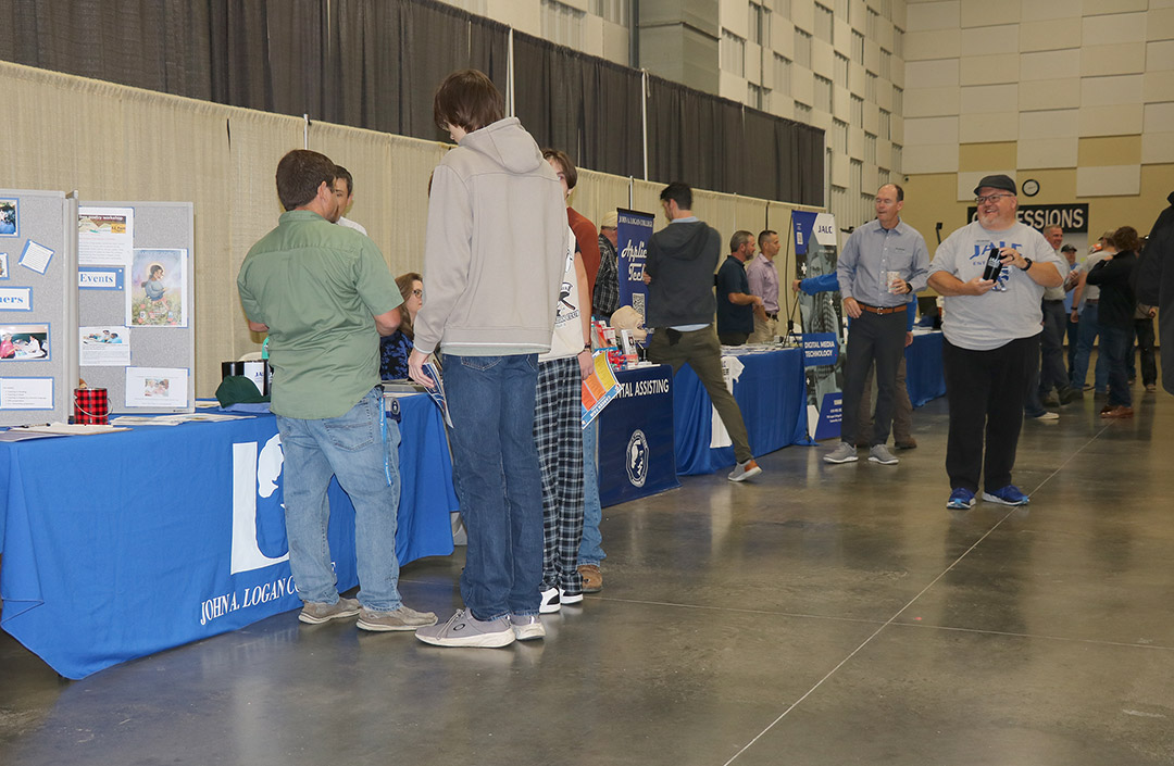 John A. Logan College staff speak with students.