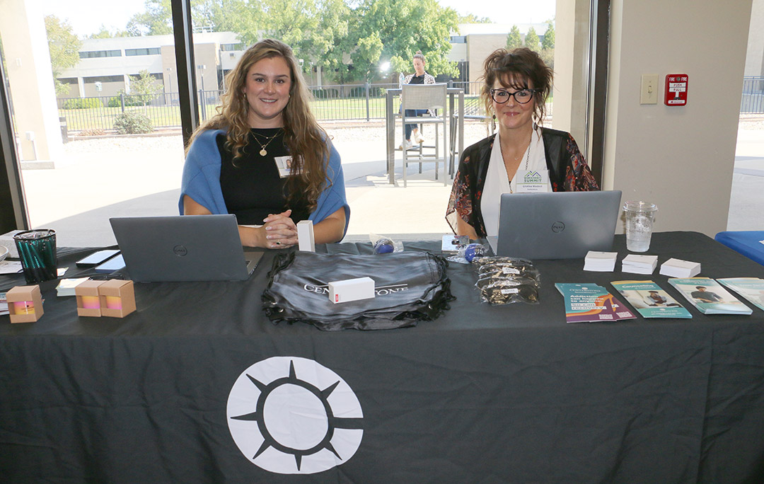 Emily Stroud and Cristina Waddell at the vendor booth for Centerstone.