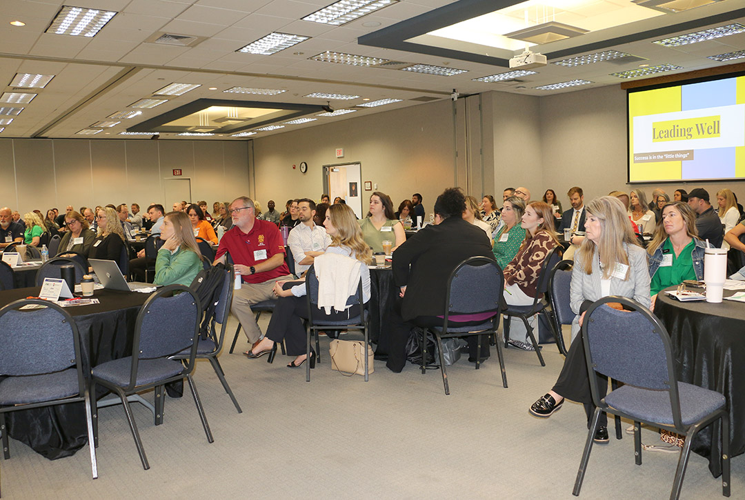 Attendees settle in as the Workforce Summit begins.