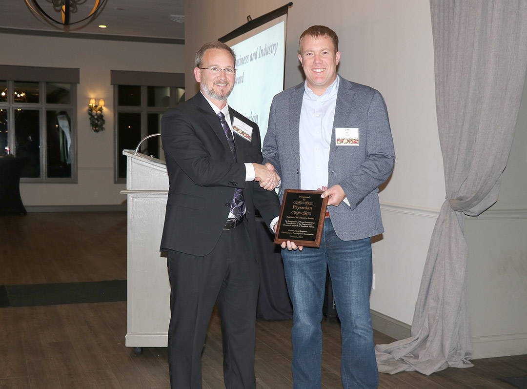 SIWDB Chair Terance Henry honors SIWDB members who have given many years of dedicated service to the board.