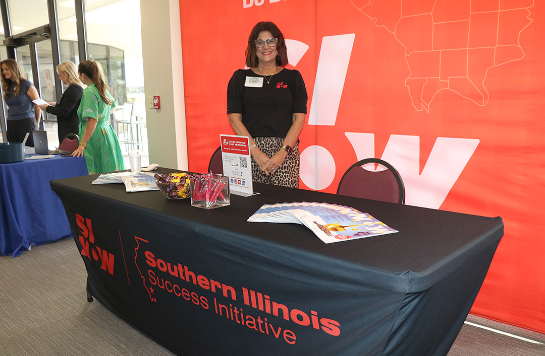 Tricia Edwards hold down the fort at the Southern Illinois Now table.